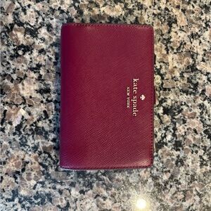 New with tags. Kate Spade Madison Santiago Leather medium Wallet.
